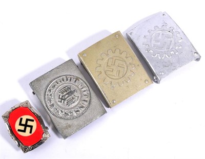 Lot 134 - A German Third Reich DAF Belt Buckle, in aluminium with cranked catch; a Similar Later DAF Belt...