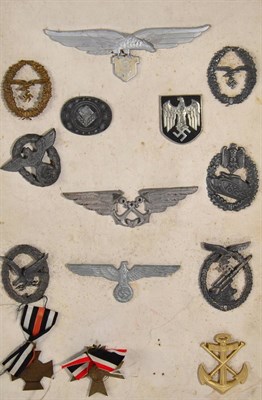 Lot 138 - A Card Display of German Third Reich Badges, Tinnies and Medals, including Anti-aircraft War Badge