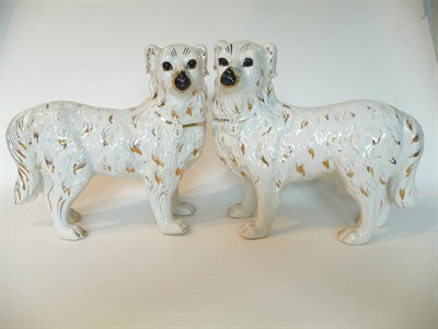 Lot 110 - A Pair of Staffordshire Pottery Figures of Newfoundlands, early 20th century, each standing...