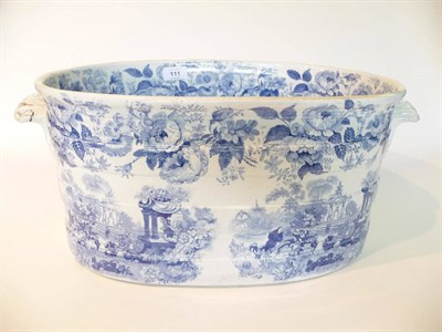 Lot 111 - A Staffordshire Pearlware Footbath, circa 1830, of ribbed oval form with fluted leaf scroll...