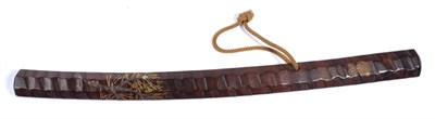 Lot 175 - A Japanese Hardwood Swagger Stick, of diagonal rib carved wakizashi shape, decorated with pine...