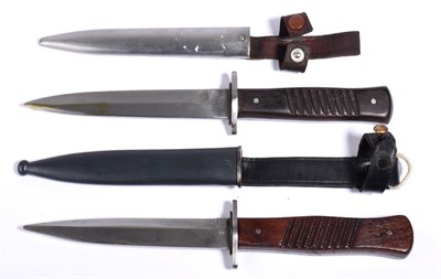 Lot 180 - Two Copies of First World War German Close-Combat Knives, each with 15cm steel blade double...