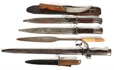 Lot 199 - Three Bayonets, including a French Mle. 92 example with associated scabbard; a trench knife,...