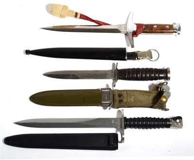Lot 207 - A Swiss M1943 Army Dagger, the double edge steel blade stamped Elsener Schwyz and numbered 31910 at