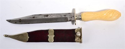Lot 215 - A Victorian Bowie Knife, the clip-point steel blade etched with an eagle in flight over...