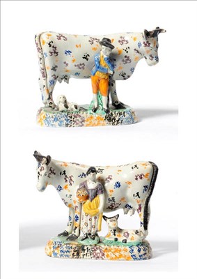 Lot 116 - A Pair of Prattware Cow Groups, circa 1810, each beast with blue, ochre and manganese sponged...