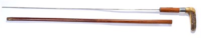 Lot 233 - A Late Victorian Malacca Swordstick, with 67.5cm tapering double edge steel blade, with antler...