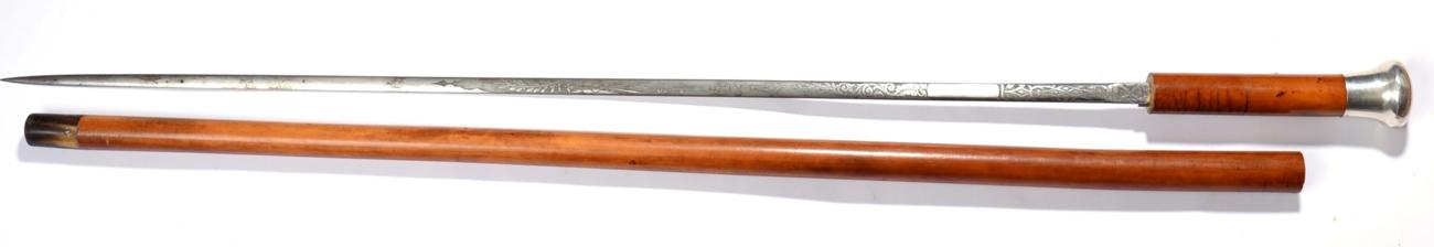 Lot 236 - A Victorian/Edwardian Malacca Swordstick, the 70.5cm tapering double edge steel blade etched...