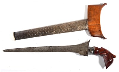 Lot 265 - A Late 19th Century Malayan Kris, with 31cm straight pamor blade, silver flowerhead mendak,...