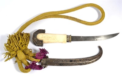 Lot 284 - A 19th Century Arab Jambiya, with 21cm curved double edge steel blade, plain bone grip, the...