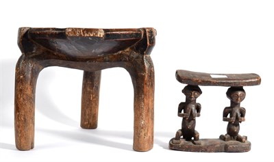 Lot 290 - A Senufo, West Africa Wood Stool, made from one piece of wood, the dished circular seat with...
