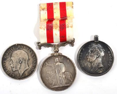 Lot 12 - An Indian Mutiny Medal, 1857-1858, name erased, no clasp; a Copy of a Waterloo Medal; a British War