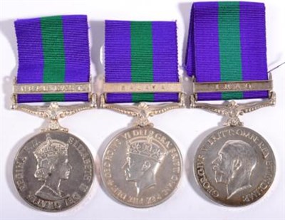 Lot 77 - Three General Service Medals 1918-62:- George V, with clasp IRAQ, awarded to 52947...