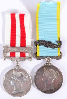 Lot 85 - A Crimea Medal 1854, with clasp SEBASTAPOL, name erased, and Indian Mutiny Medal 1858, with...