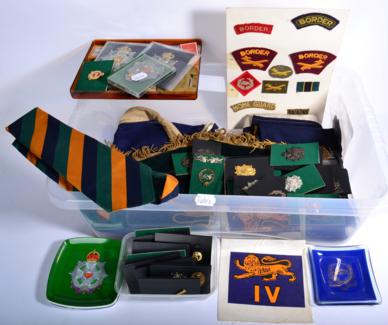 Lot 111 - The Border Regiment:- a collection of thirty five cap and collar badges and shoulder titles,...