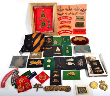 Lot 116 - The King's Own Royal Regiment (Lancaster):- a collection of fifteen shoulder titles in brass, white
