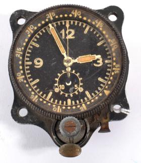 Lot 133 - A Second World War German Messerschmitt Bf 109 Cockpit Clock, circa 1940, the black dial and...