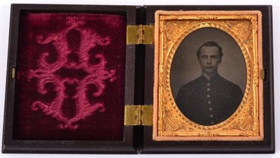 Lot 179 - An American Civil War Tintype Portrait of a Federal Soldier, half length, in a Union case, 8cm...