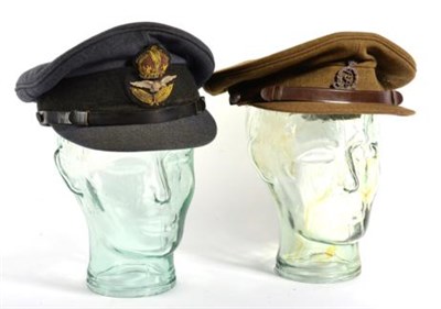 Lot 219 - A Second World War RAF Officer's Peaked Cap, with black woven mohair cap band and raised...