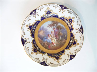 Lot 157 - A Sevres Style Porcelain Cabinet Plate, 19th century, painted with a youth and two girls...