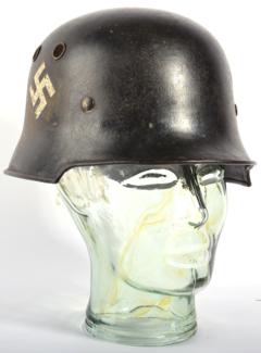 Lot 285 - A German Third Reich Double Decal Police Helmet, the inner left brim stamped with a large F and...