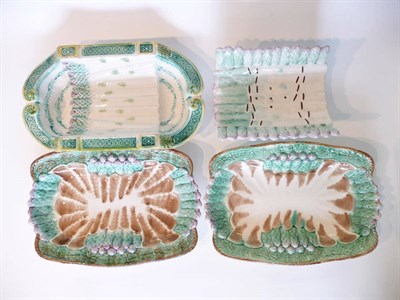 Lot 164 - A Longchamp Pottery Pierced Asparagus Dish and Two Stands, circa 1870, modelled as bundles of...