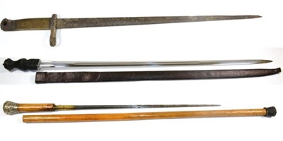 Lot 318 - A Victorian Malacca Sword Stick, with 50cm cruciform steel blade, the silver metal pommel...