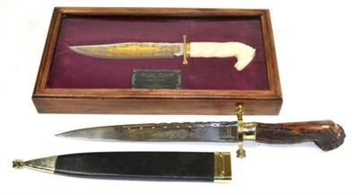 Lot 352 - A Modern Dirk, the 28cm scallop back steel blade acid etched with thistles, stamped F.W.JAMES,...