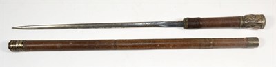 Lot 353 - An Unusual Swordstick / Swagger Stick, the 32.5 cm  etched blade by Cogswell & Harrison Ltd.,...