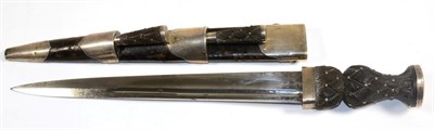 Lot 360 - A Late 19th Century Scottish Dirk, with 29.5cm single edge double fullered steel blade, the...