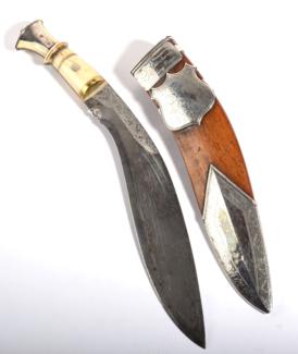 Lot 372 - An Early 20th Century Indian Kukri, the 25cm curved steel blade engraved at the ricasso with...