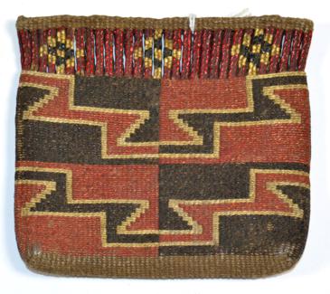 Lot 385 - A Native North American Flat Pouch, woven in red, black and white with a geometric design below...