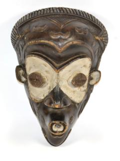 Lot 394 - An African Gaigon Mask, of ebonised wood, with incised and chequered coiffure, domed forehead,...