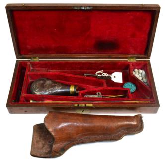 Lot 398 - A 19th Century Mahogany Pistol Case, with inset brass lock escutcheon, the crimson velvet lined...