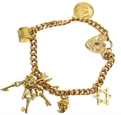 Lot 6 - A 9 carat gold charm bracelet