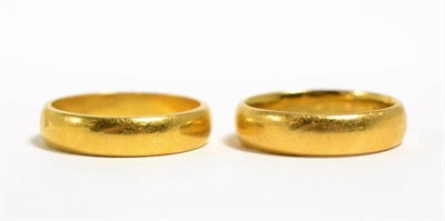 Lot 10 - Two 22 carat gold band rings