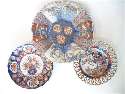 Lot 184 - An Imari Porcelain Octafoil Dish, late 19th century, painted with three mons within brocade and...