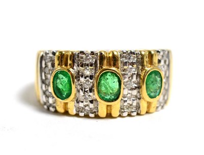 Lot 19 - An emerald and diamond ring, finger size N, stamped '750', 5.9g