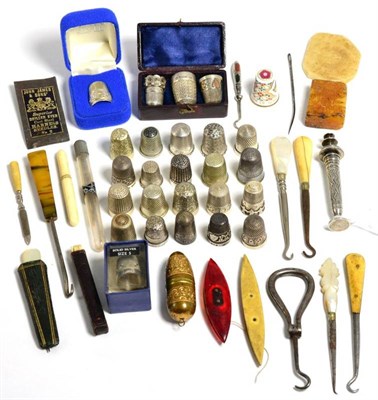 Lot 30 - Fourteen silver thimbles, including examples by Charles Horner; a white metal combination...
