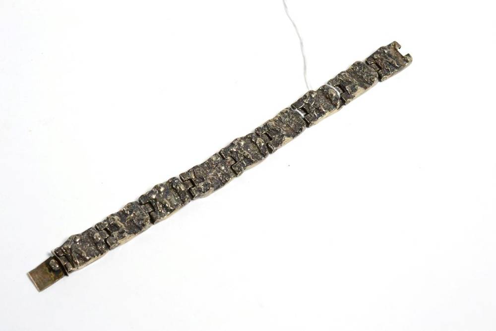 Lot 38 - A Brutalist bracelet, of heavily textured links, length 19cm, 59.8g