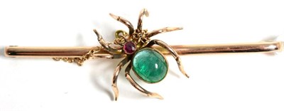 Lot 42 - A late 19th century emerald and ruby spider brooch, with a large cabochon emerald abdomen and...