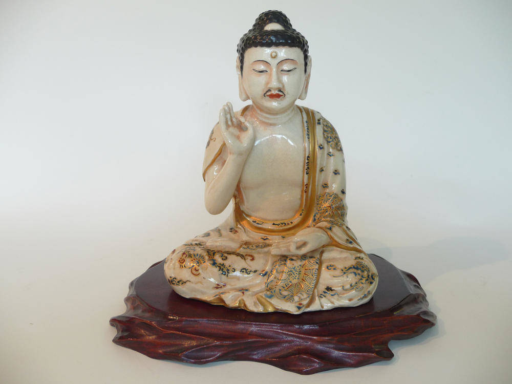 Lot 188 - A Satsuma Earthenware Figure of Buddha, late