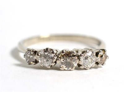 Lot 65 - A diamond five stone ring, total estimated diamond weight 0.65 carat approximately, finger size...