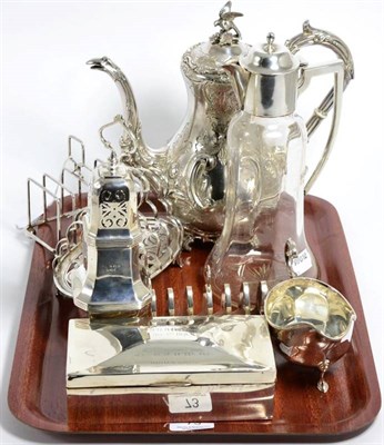 Lot 73 - A silver and glass claret jug, Birmingham, 1907; a silver cigarette box; large silver caster;...
