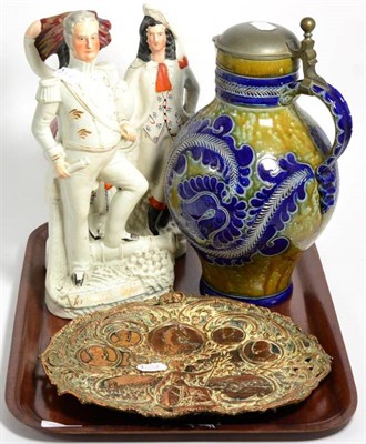 Lot 79 - Two Staffordshire flat back figures including Charles Napier; German pottery flagon and copper dish