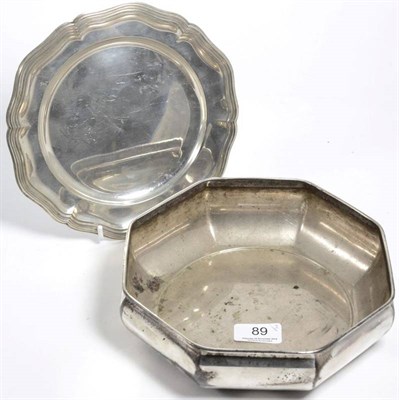 Lot 89 - A German silver plate, 830 standard, engraved with the initial M; and a metalware octagonal...