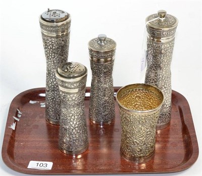 Lot 103 - Four Cambodian white metal pepper mills and salt shakers, the salt s stamped ''Paong 900'';...