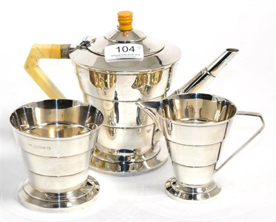 Lot 104 - An Art Deco silver three piece tea service, Viners Ltd