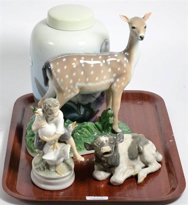 Lot 110 - A Royal Copenhagen fawn; cow; goose; and boy; together with a vase and cover
