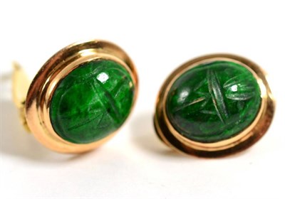 Lot 134 - A pair of carved malachite scarab earrings, stamped 'K18'